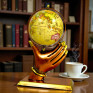 Handcrafted Vintage World Globe with Antique Hand-Shaped Stand - Decorative Rotating Geographic Globe for Office Desk, Study Table and Home Decor - Unique Educational and Corporate Gift (Antique Gold & Brown)
